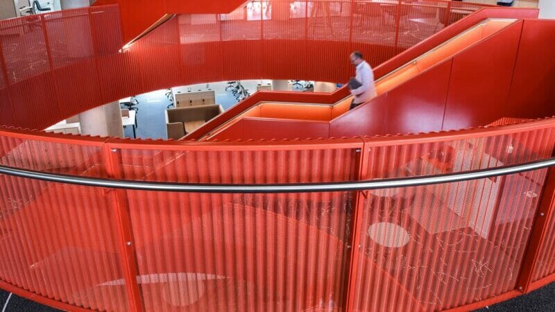 Vermillion powder coating feature in sbarc|spark hub, Cardiff University