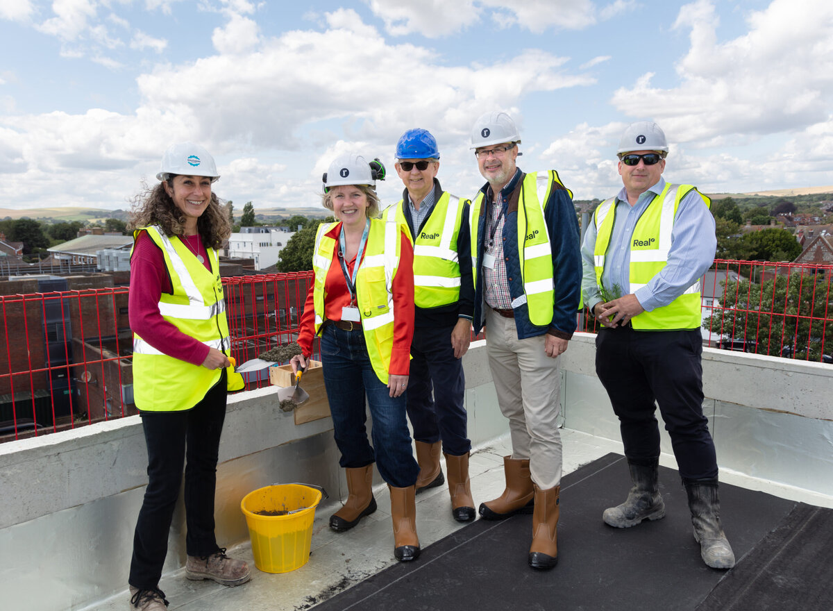 Real tops out The Mannings, a low carbon housing project in Shoreham-by-Sea.