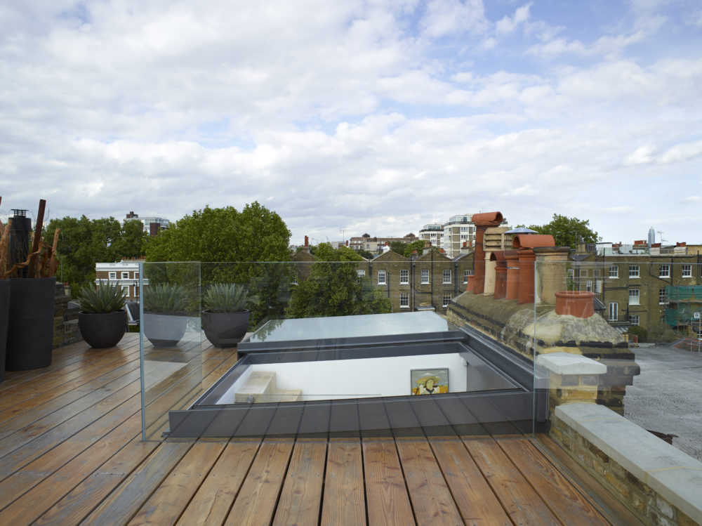 Sliding over rooflight provides ease of access to Victorian townhouse