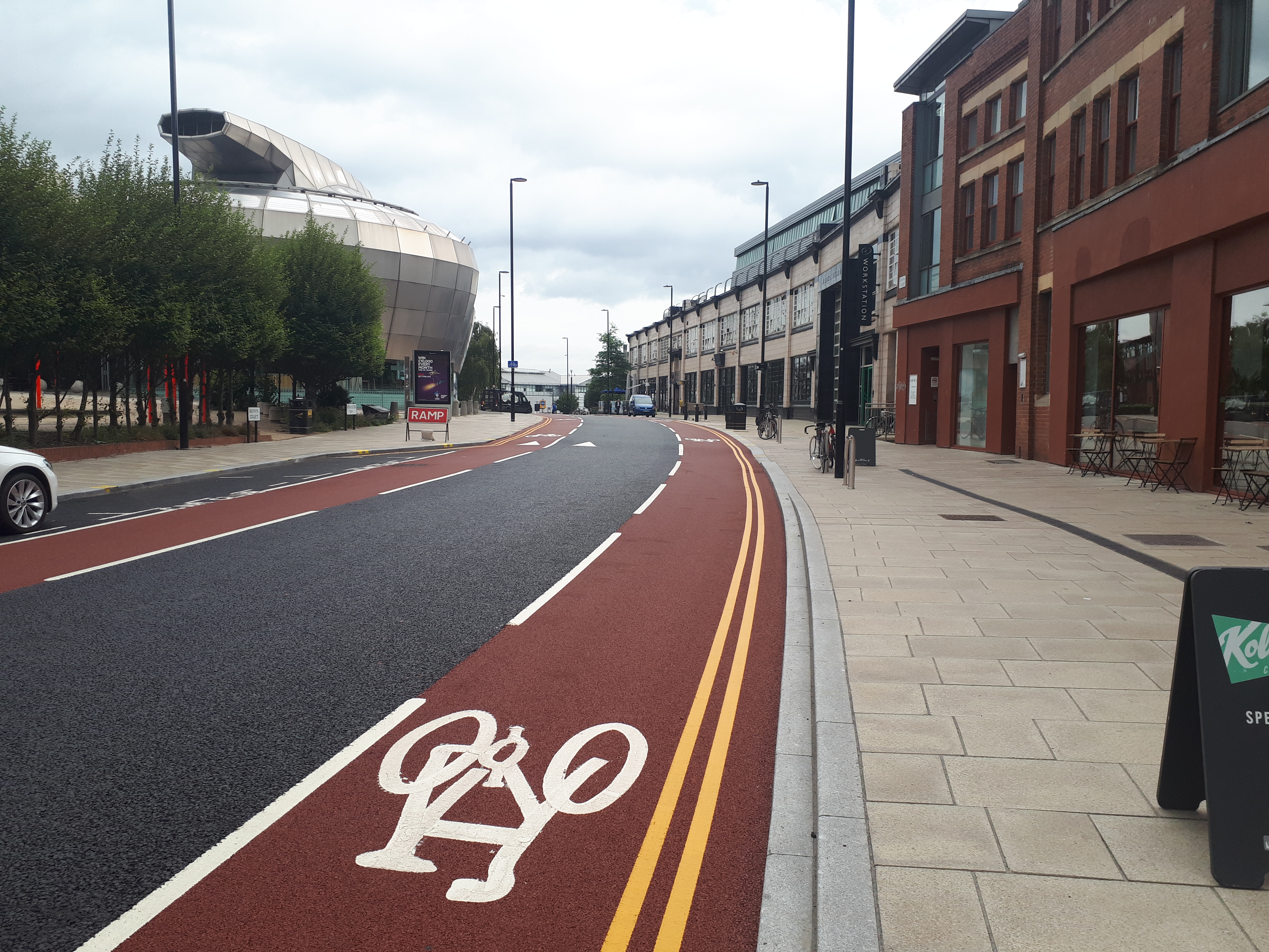 Surfacing The Town Red: Aggregate Industries supplies red asphalt to Sheffield cycle lane @AggregateUK